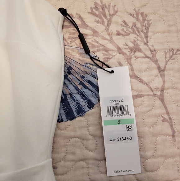 Solid Sleeveless Cascading Ruffle Dress - Picture 10 of 10